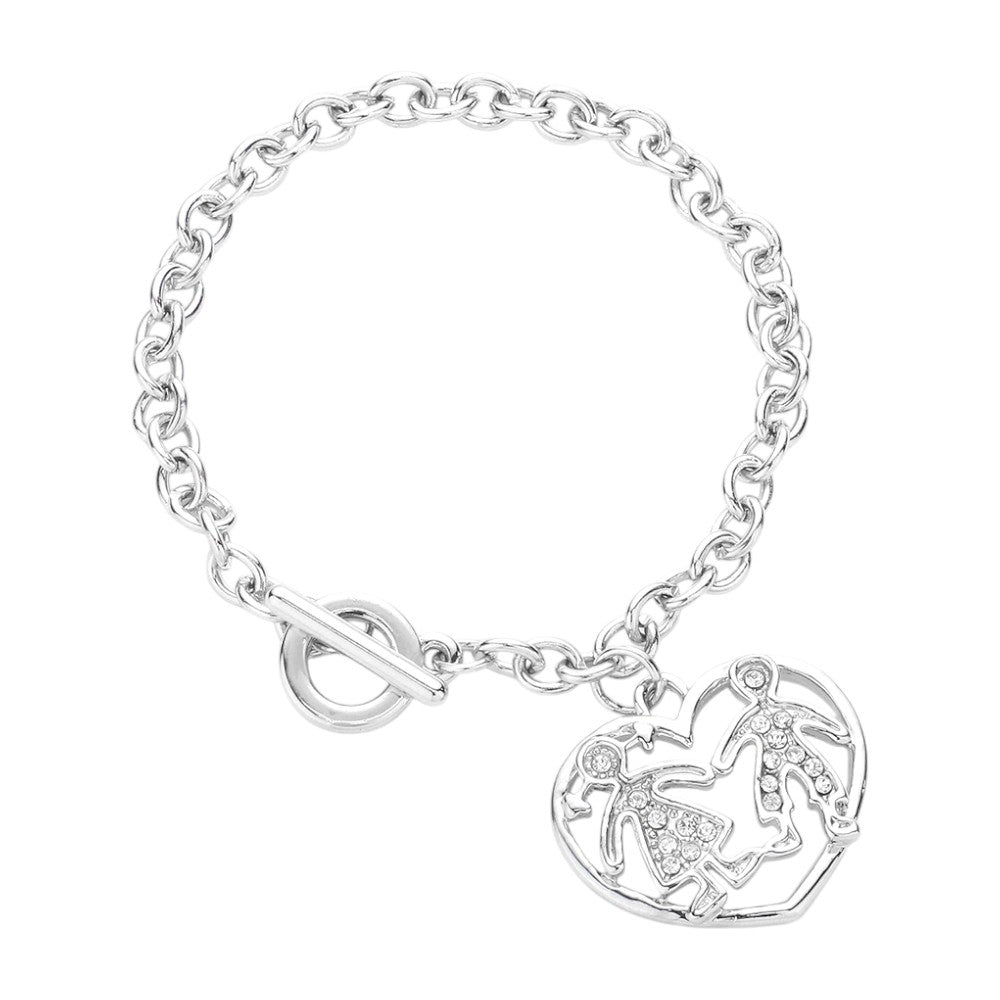 Silver pavé crystal children heart charm toggle bracelet on white background