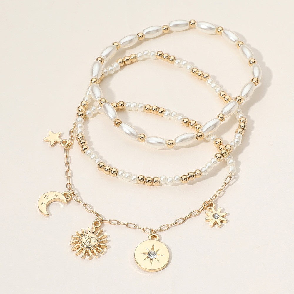Gold Tone 3-Strand Pearl Beaded Bracelet Stretched with Sun Star Crescent Charm
