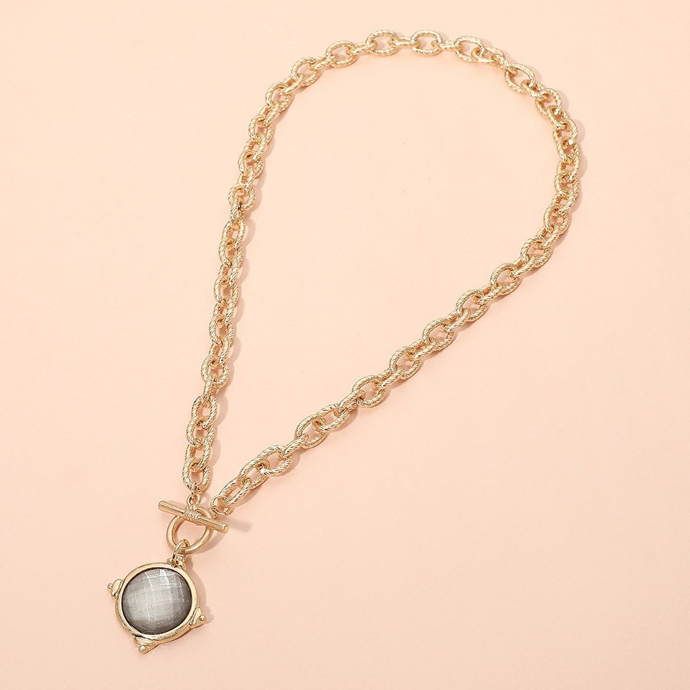 Gold Tone Rope Chain Toggle Necklace with Grey Stone Round Pendant 18 Inches