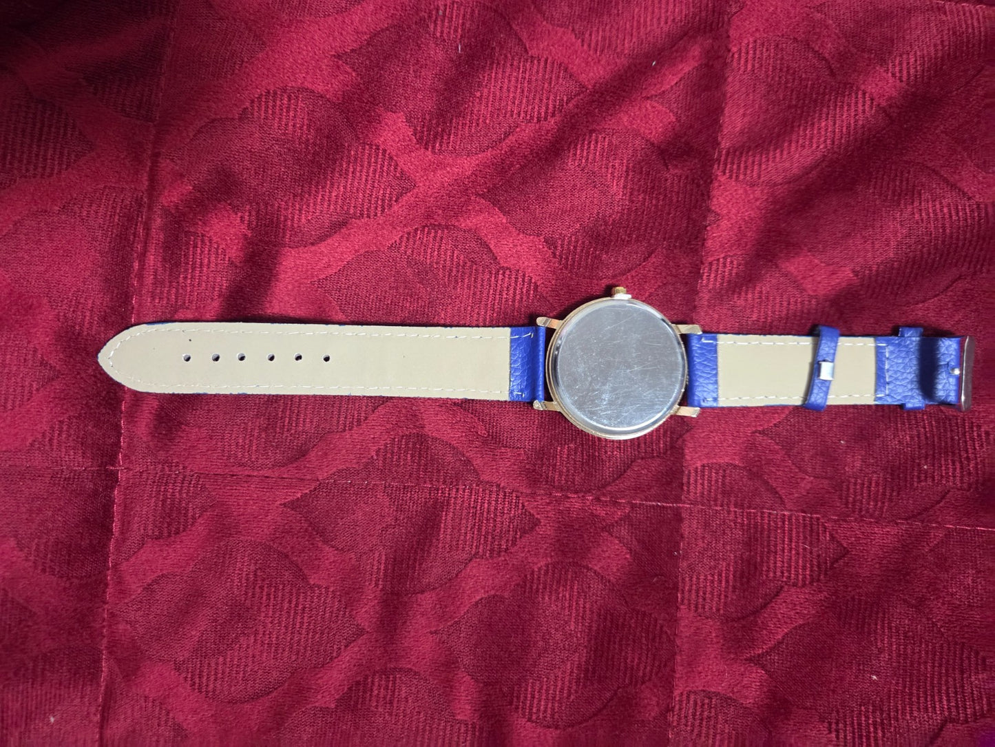 Women's Fashion Watch with Blue Strap & Butterfly Dial Roman Numerals