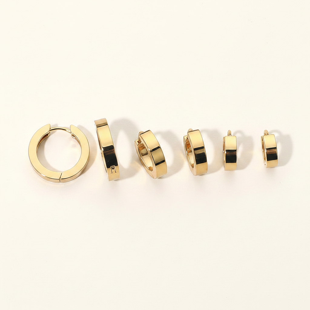 Gold Huggie Hoops - Flat Lay