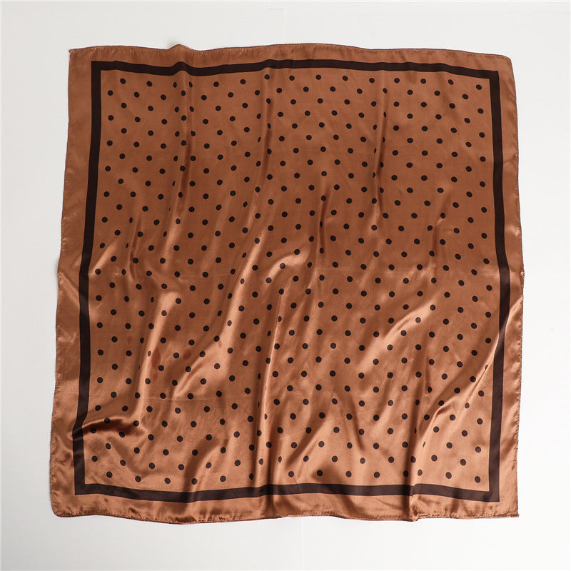 Caramel and black polka dot satin square scarf flat lay showing border stripe detail