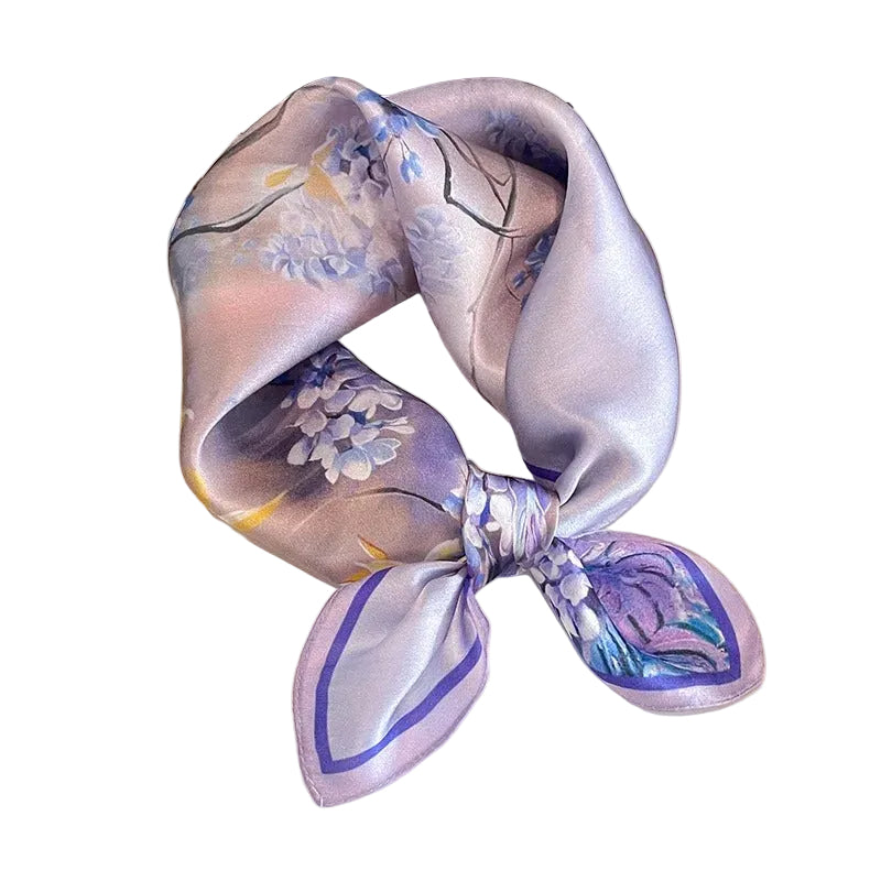 Lavender wisteria real silk square scarf tied in a knot, showing floral print and violet border