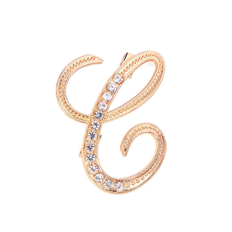 Gold Crystal Initial C Letter Brooch Pin in cursive script with clear rhinestone crystals on gold-tone metal