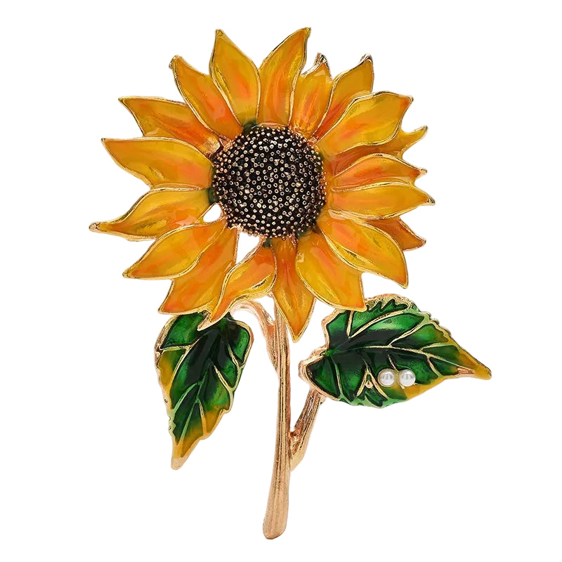 Sunflower enamel brooch side angle on white ceramic surface