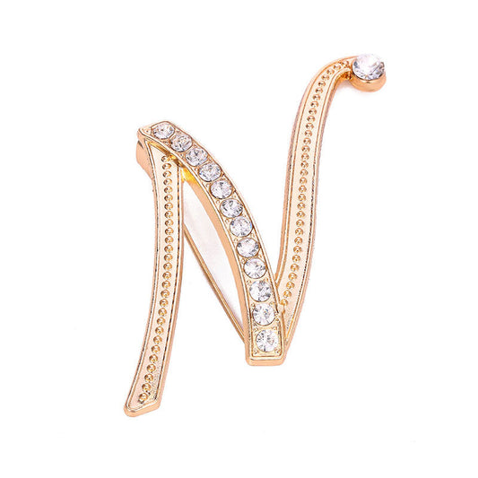 Gold Crystal Initial N Letter Brooch Pin in bold script with clear rhinestone crystals and large crystal accent on gold-tone metal