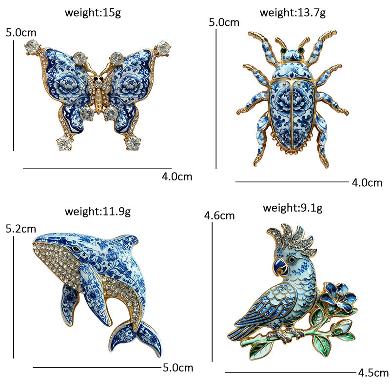Set of 4 blue porcelain enamel brooches with measurements – butterfly, beetle, whale, and parrot