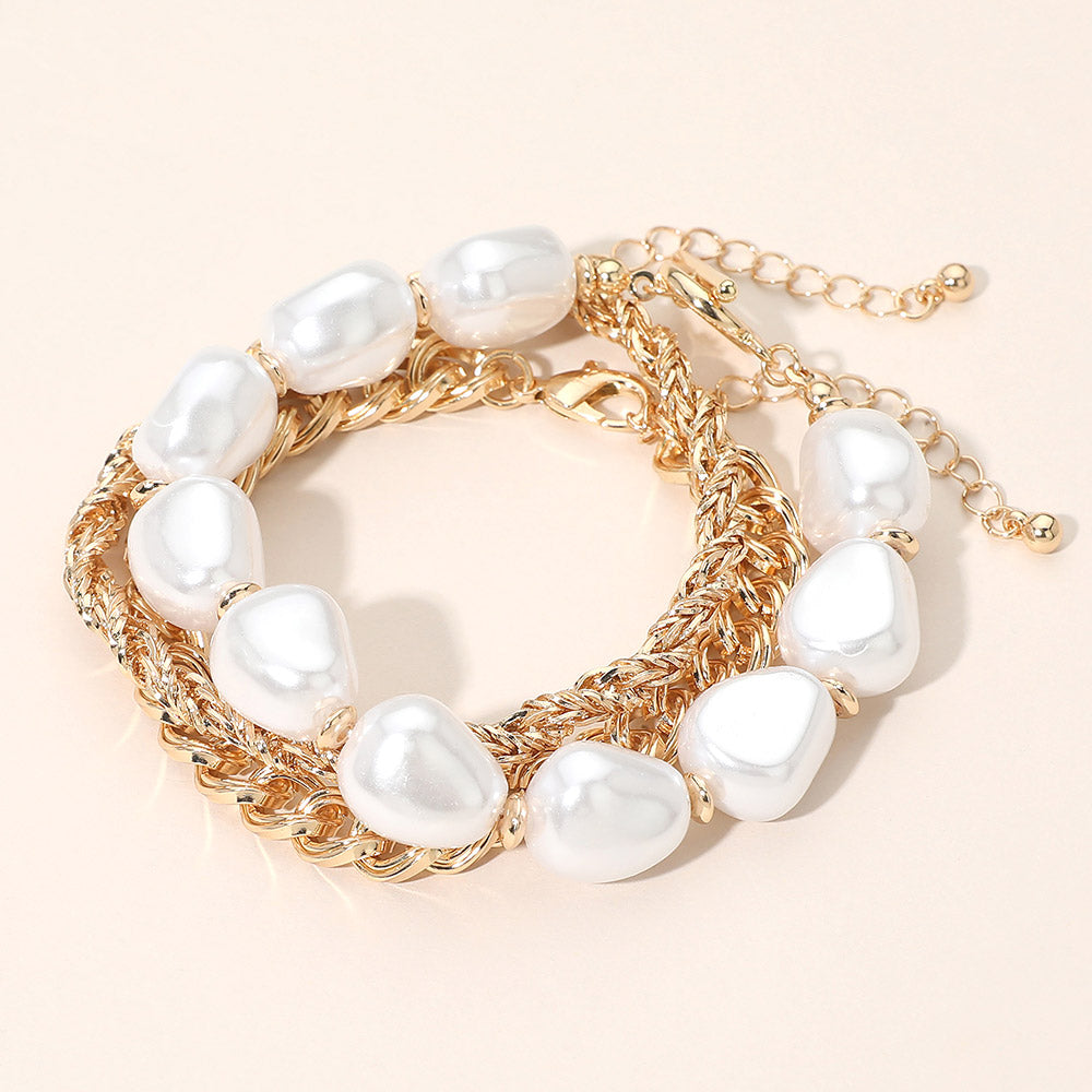3-piece baroque pearl and gold chain bracelet set laid flat showing all three styles