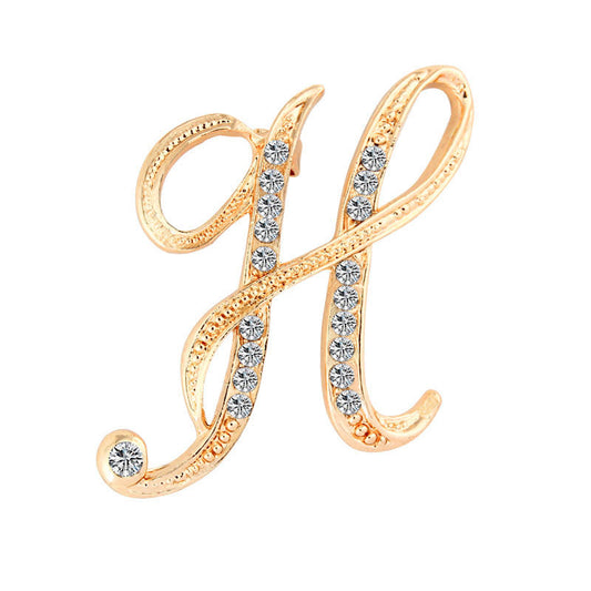 Gold crystal initial H letter brooch pin in script style with rhinestone embellishments