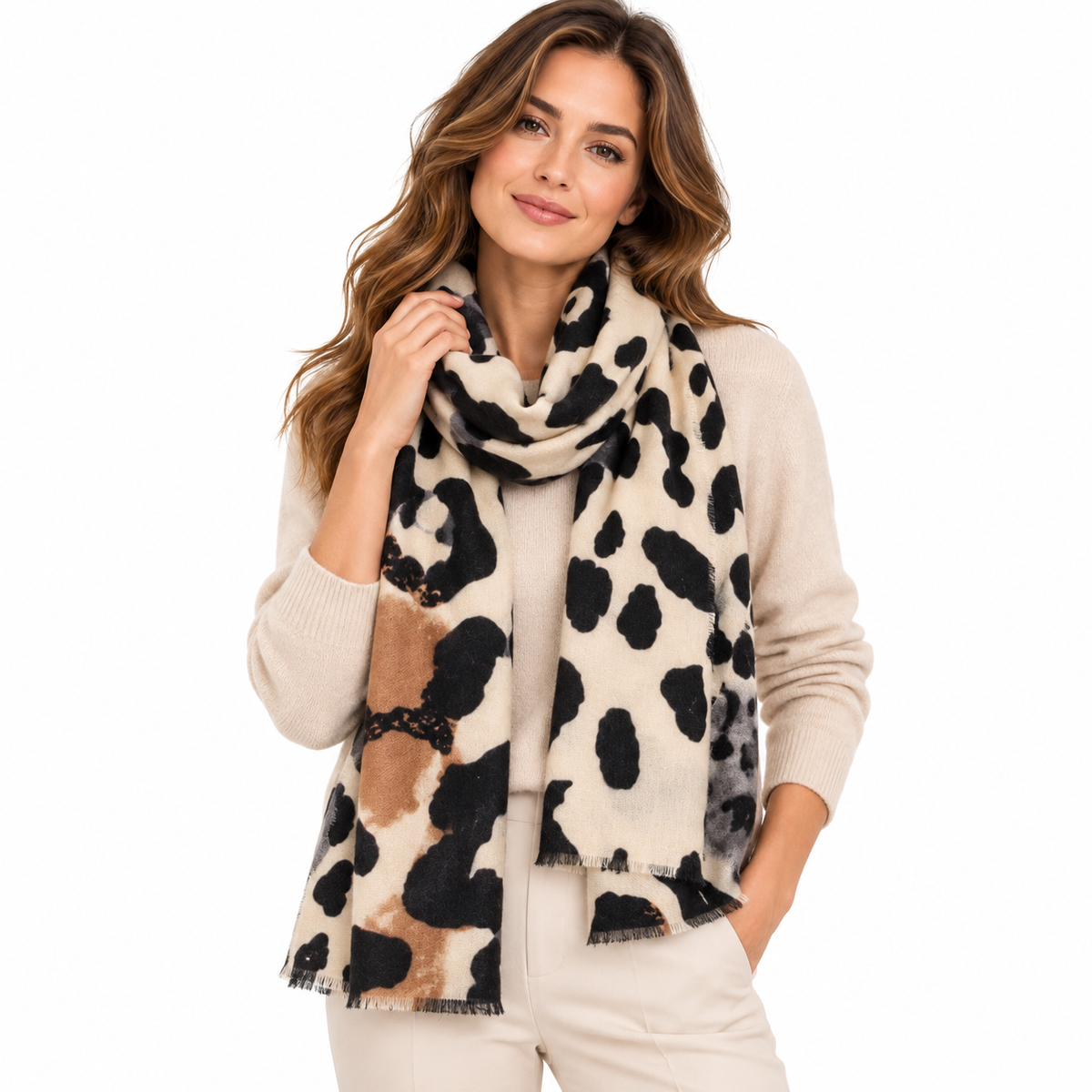 Women's oversized animal print scarf beige black cashmere feel – flat lay folded view showing full print and fringe edges