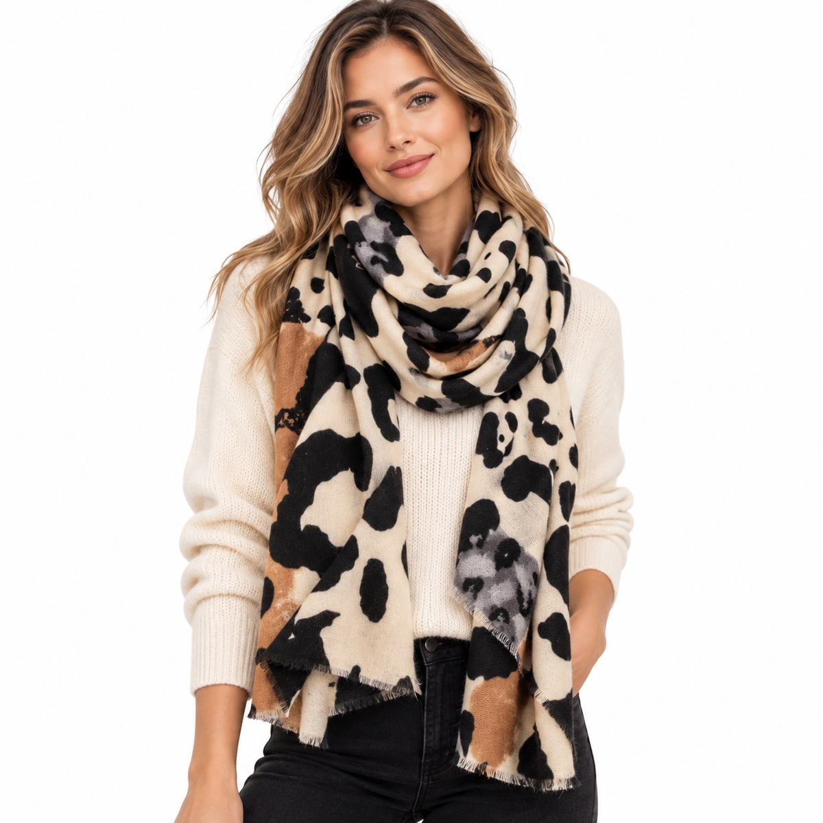 Women's oversized animal print scarf beige black cashmere feel – styled wrapped around neck over ivory sweater with black jeans