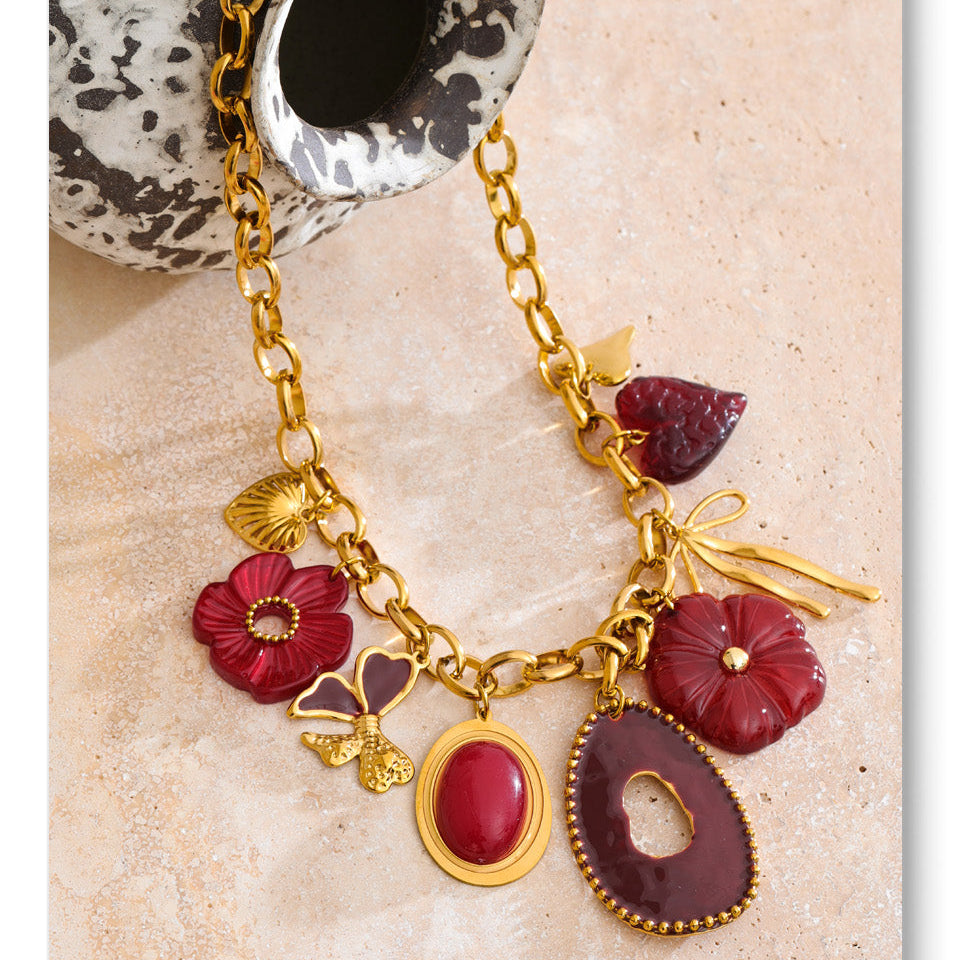 Gold Tone Chunky Chain Necklace with Red Resin Flower and Heart Charms