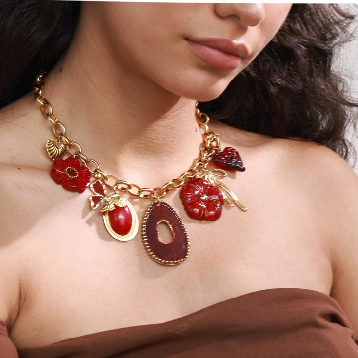 Gold Tone Chunky Chain Necklace with Red Resin Flower and Heart Charms
