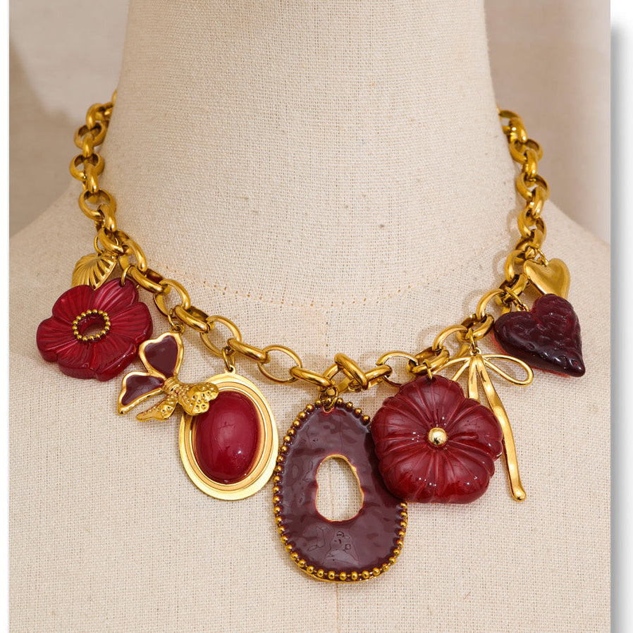 Gold Tone Chunky Chain Necklace with Red Resin Flower and Heart Charms