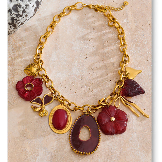 Gold Tone Chunky Chain Necklace with Red Resin Flower and Heart Charms