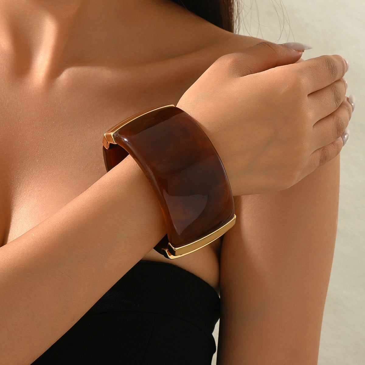 Wide Brown Bangle Bracelet with Gold-Tone Accents