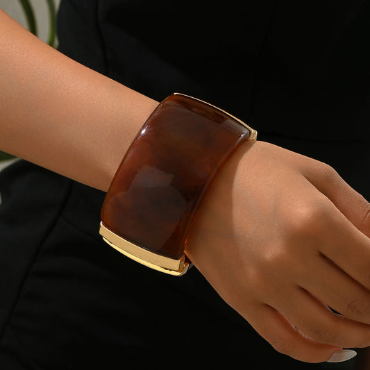 Wide Brown Bangle Bracelet with Gold-Tone Accents