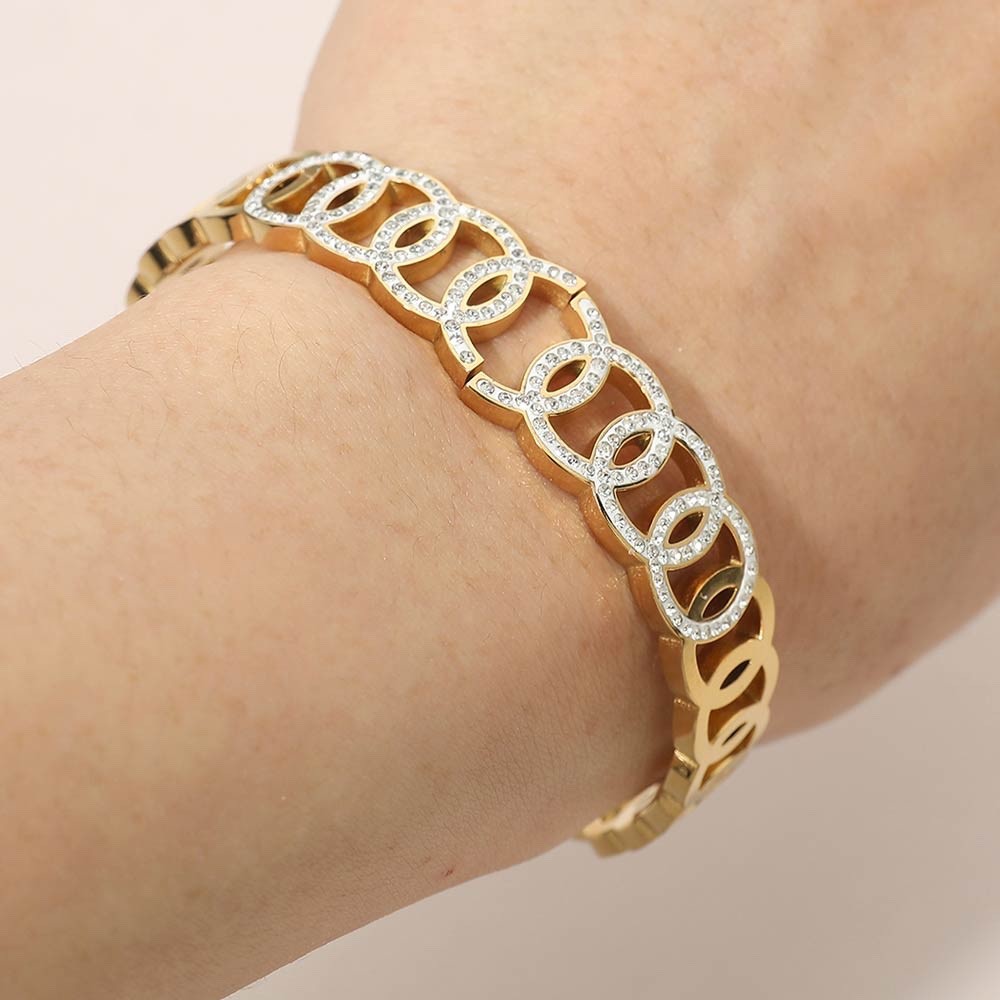 Gold Interlocking Oval Bangle Bracelet with Pave Crystal Accents Stainless Steel
