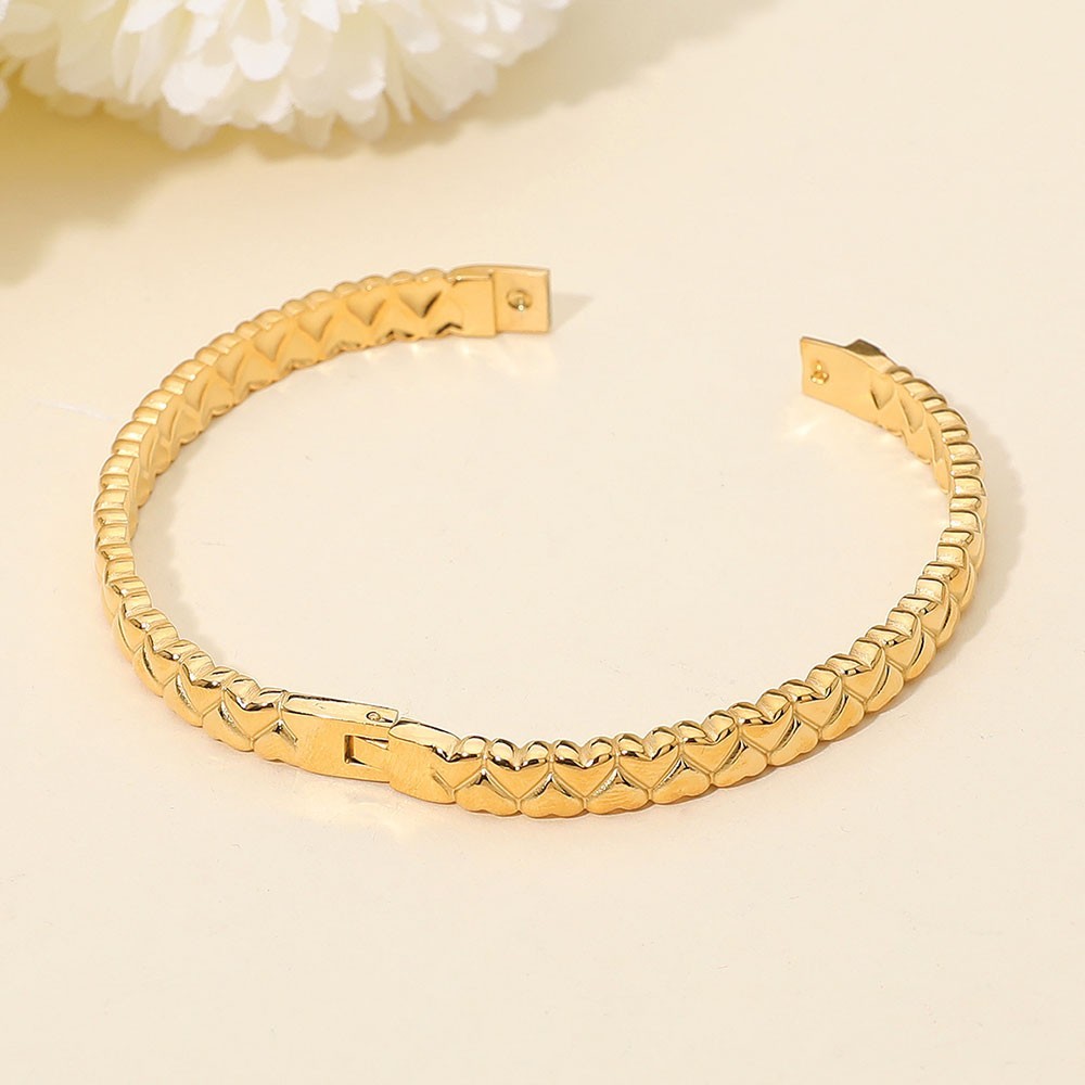 Gold Tone Stainless Steel Heart Textured Bangle Bracelet with Hinged Closure