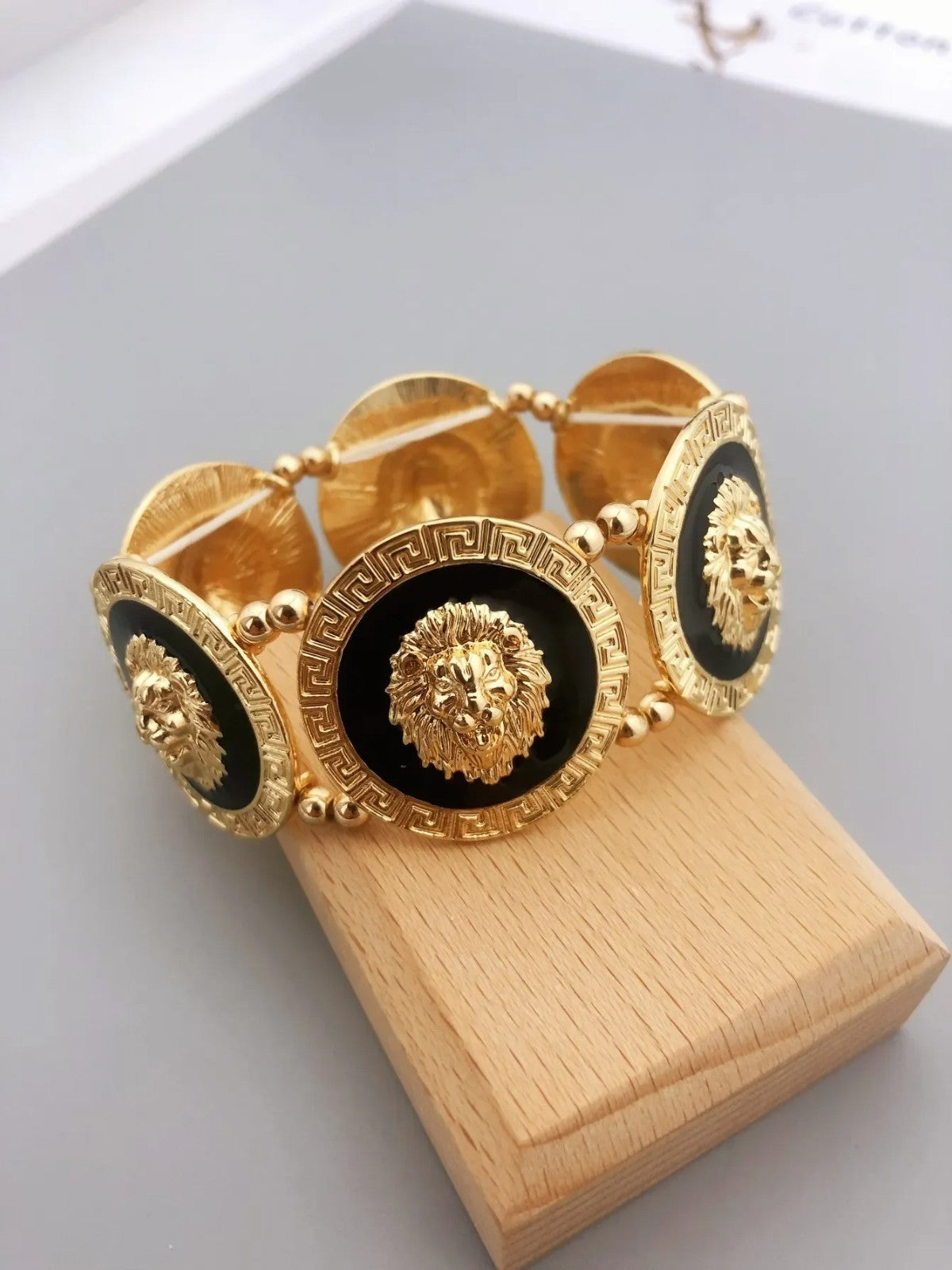 Gold Tone Lion Head Bracelet Black Enamel Greek Key Stretch Medallion 6.7in