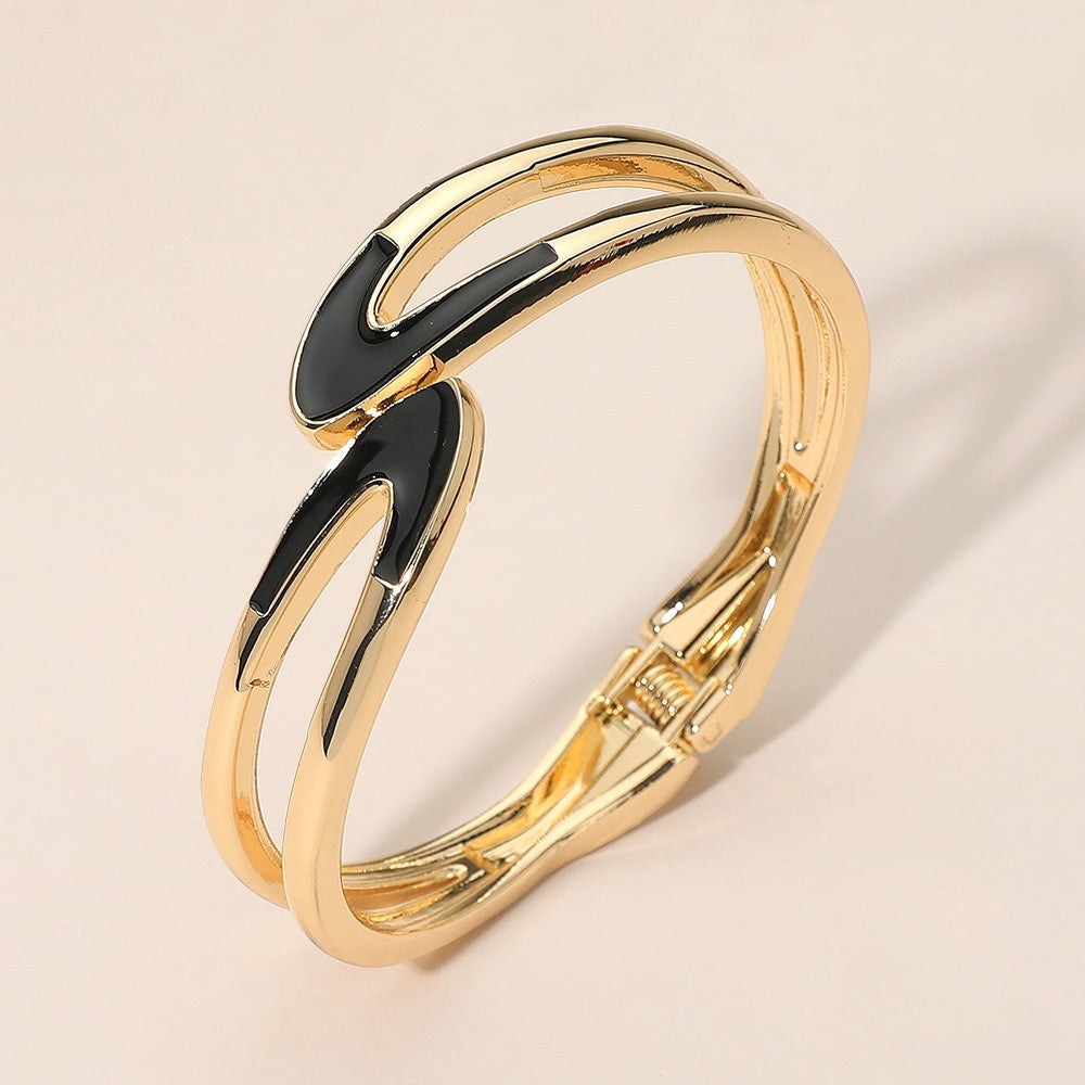 Gold Interlocking Abstract Hinged Bangle Bracelet with Black Enamel Inlay