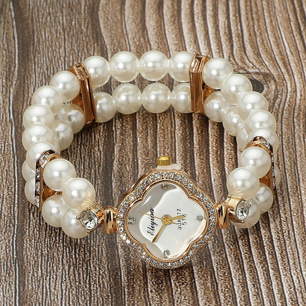 Stainless Steel Pearl Beaded Stretch Bracelet Watch Stone Paved Quatrefoil Bezel