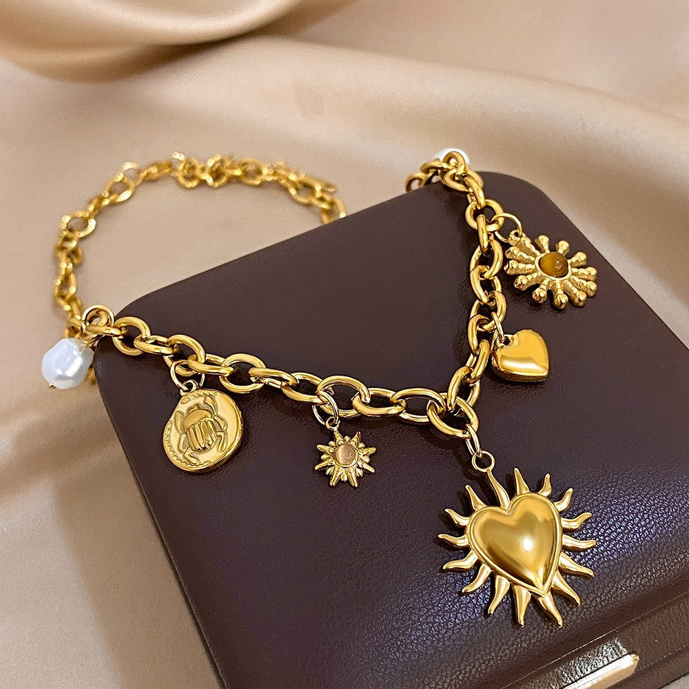 Gold Tone Celestial Charms Statement Necklace for Women Moon and Star Jewelry