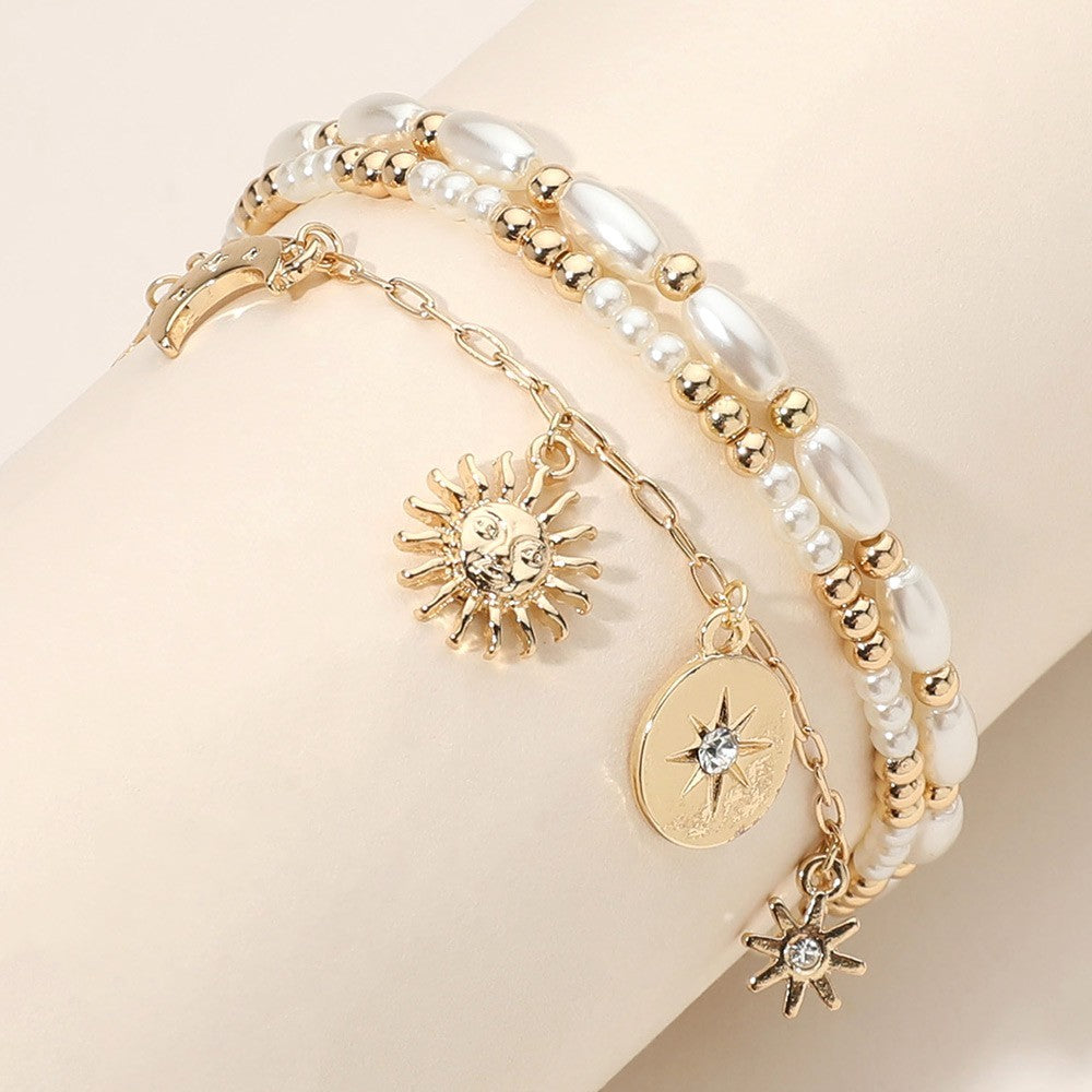 Gold Tone 3-Strand Pearl Beaded Bracelet Stretched with Sun Star Crescent Charm