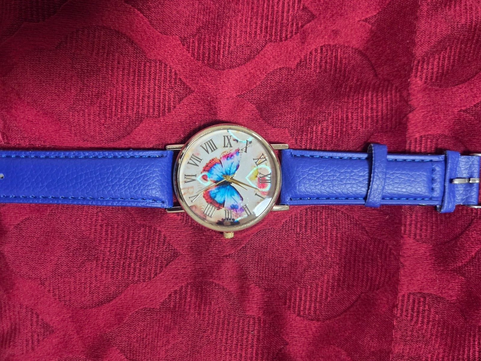 Women's Fashion Watch with Blue Strap & Butterfly Dial Roman Numerals