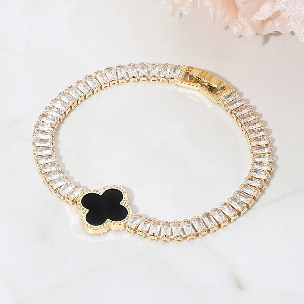 CZ Baguette Cluster Quatrefoil Charm Fold Over Closure Black & Gold Bracelet