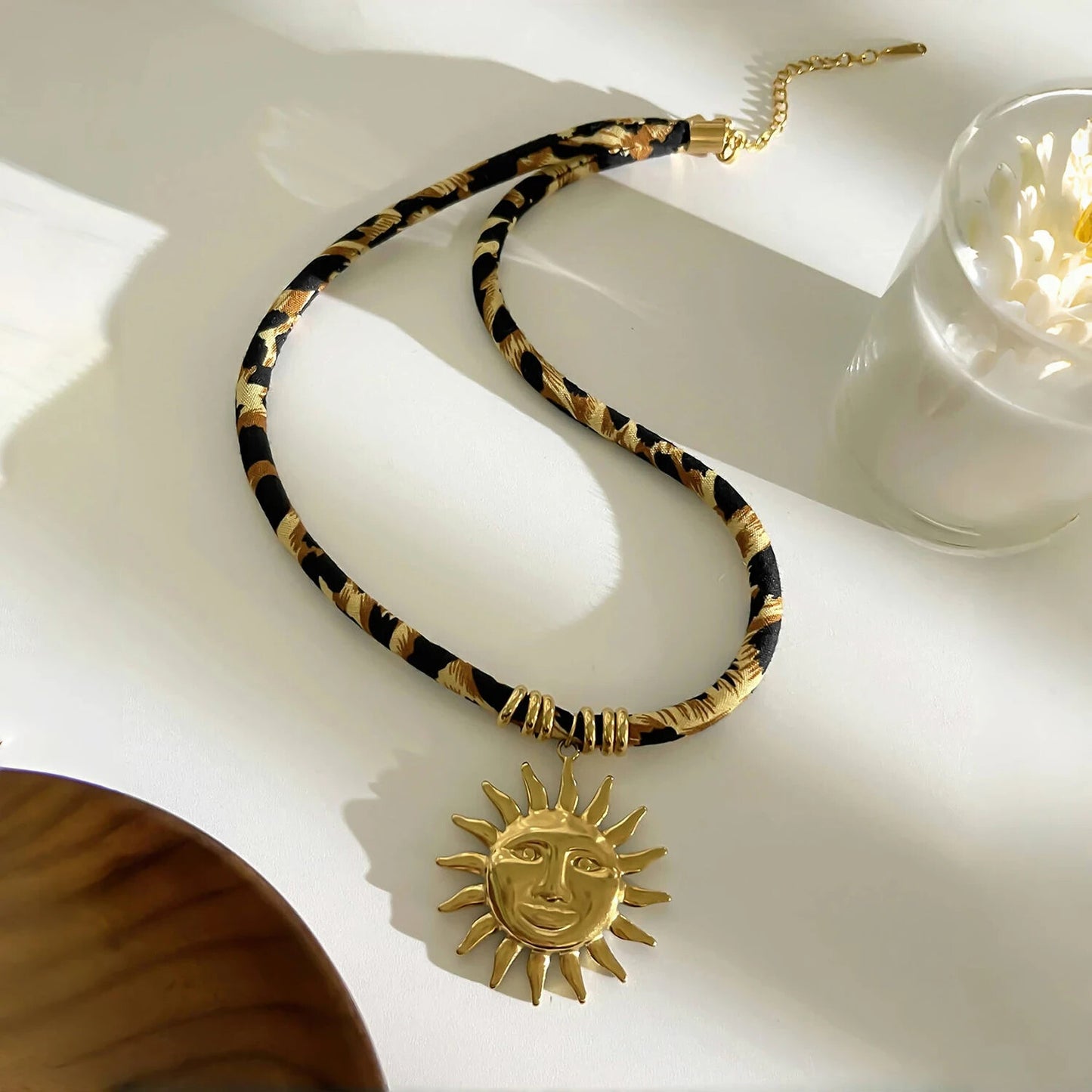 Leopard Print Fabric Necklace with Bold Gold Stainless Steel Sun Charm Pendant
