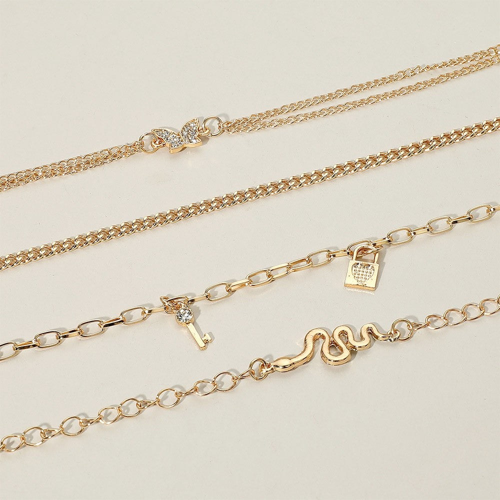 4pcs Boho Gold Tone Layered Anklet Set Butterfly Snake Key Lock Charms Jewelry