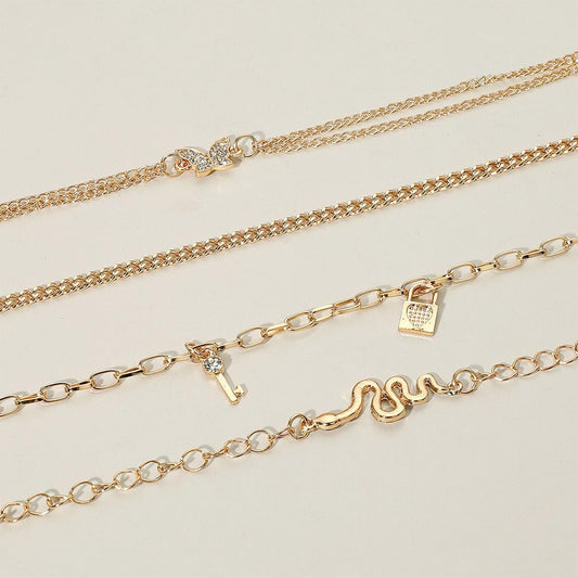 4pcs Boho Gold Tone Layered Anklet Set Butterfly Snake Key Lock Charms Jewelry