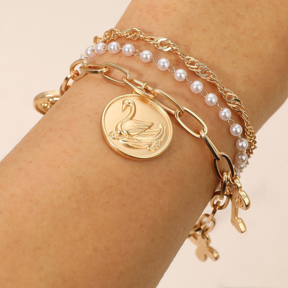 3pcs Gold Layered Charm Bracelet Set Swan Rose Key Cross Faux Pearl Gift Set