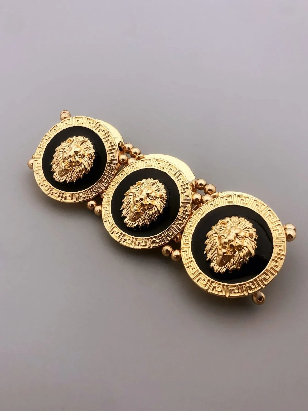 Gold Tone Lion Head Bracelet Black Enamel Greek Key Stretch Medallion 6.7in