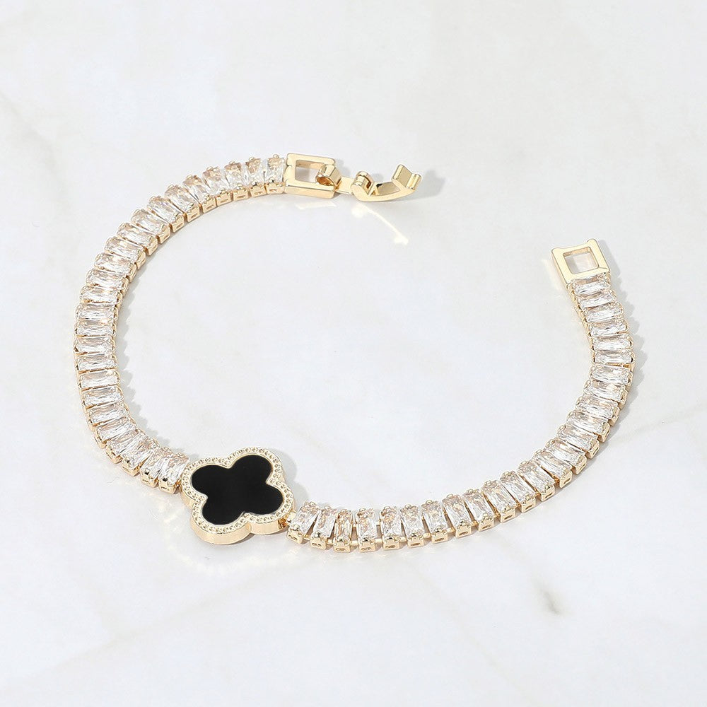 CZ Baguette Cluster Quatrefoil Charm Fold Over Closure Black & Gold Bracelet