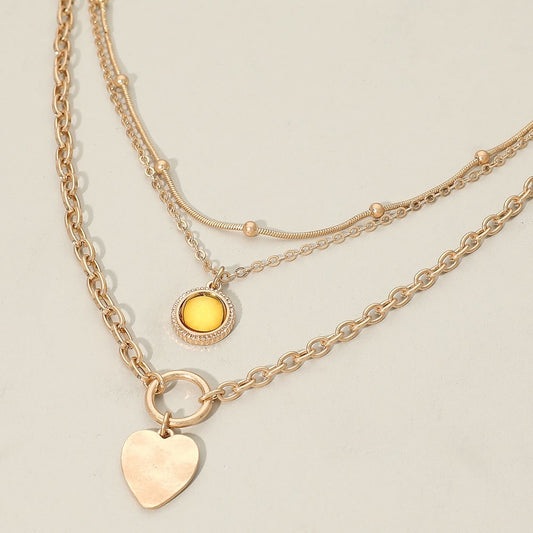 Gold Triple Layered Mixed Chain Amber Stone Heart Pendant Statement Necklace