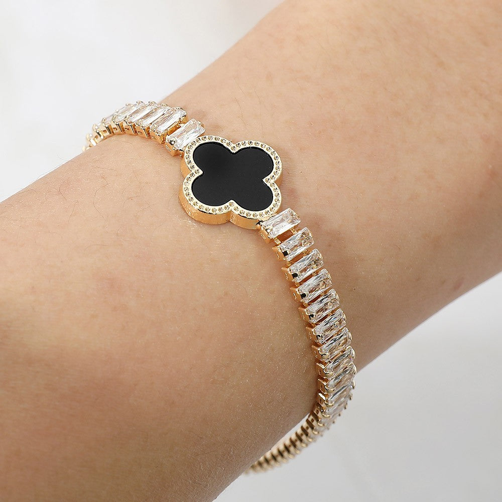 CZ Baguette Cluster Quatrefoil Charm Fold Over Closure Black & Gold Bracelet