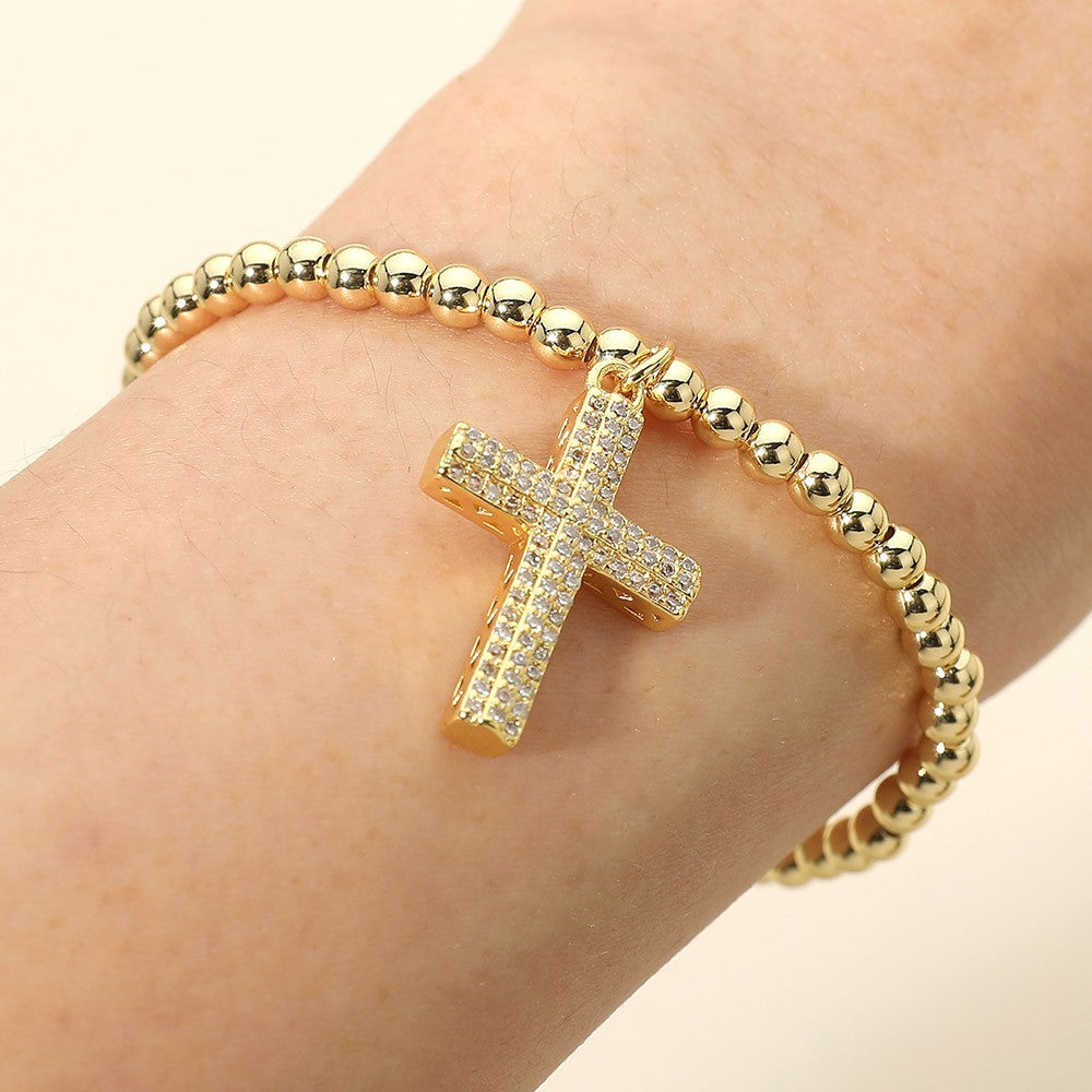 Gold Tone Stainless Steel Paved Clear CZ Cross Charm Beaded Stretch Bracelet