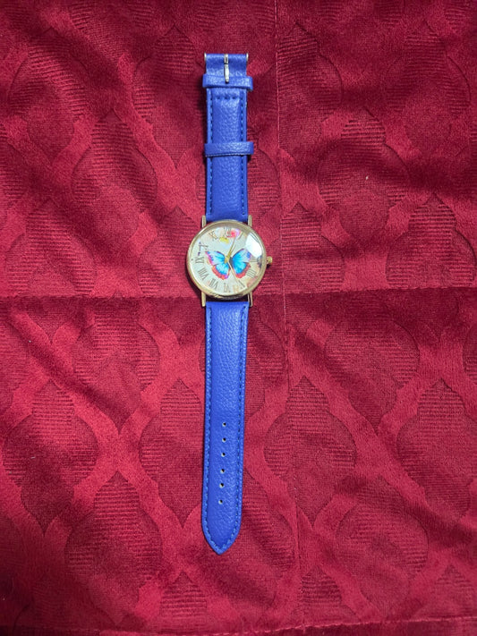 Women's Fashion Watch with Blue Strap & Butterfly Dial Roman Numerals