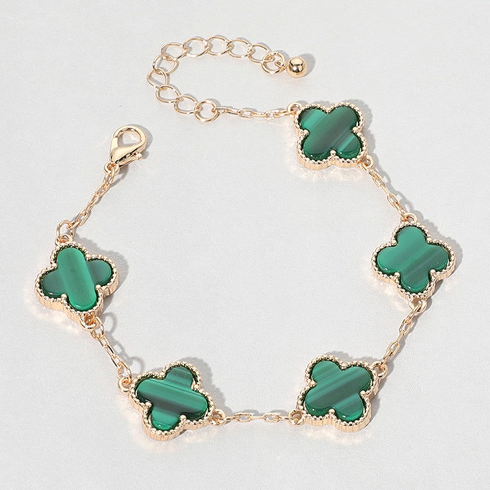 Gold Tone Quatrefoil Link Bracelet with Emerald Green Accents Fashion Jewelry