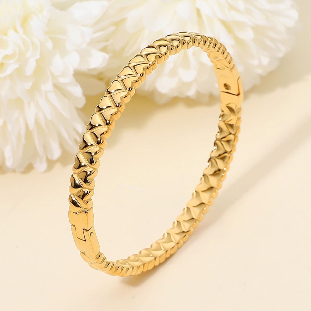 Gold Tone Stainless Steel Heart Textured Bangle Bracelet with Hinged Closure
