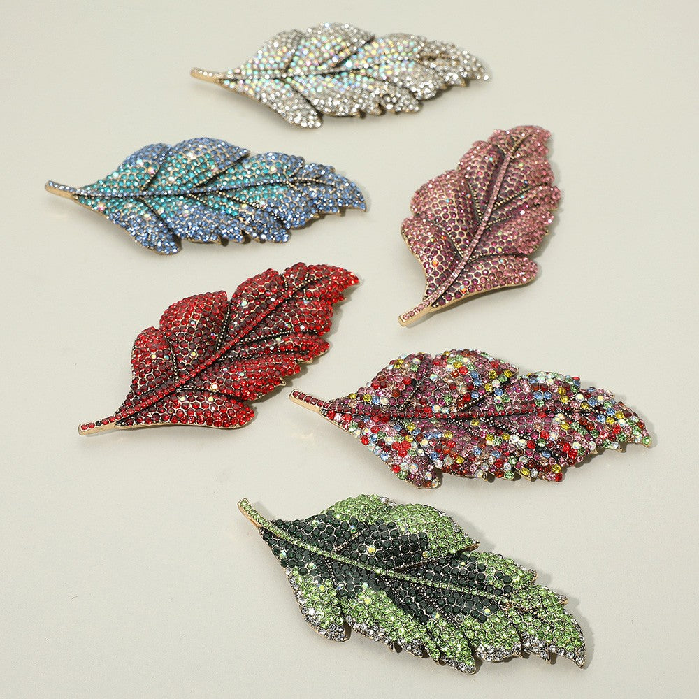 Womens Gold Tone Sparkling Red Rhinestone Paved Leaf Shaped Statement Pin Brooch