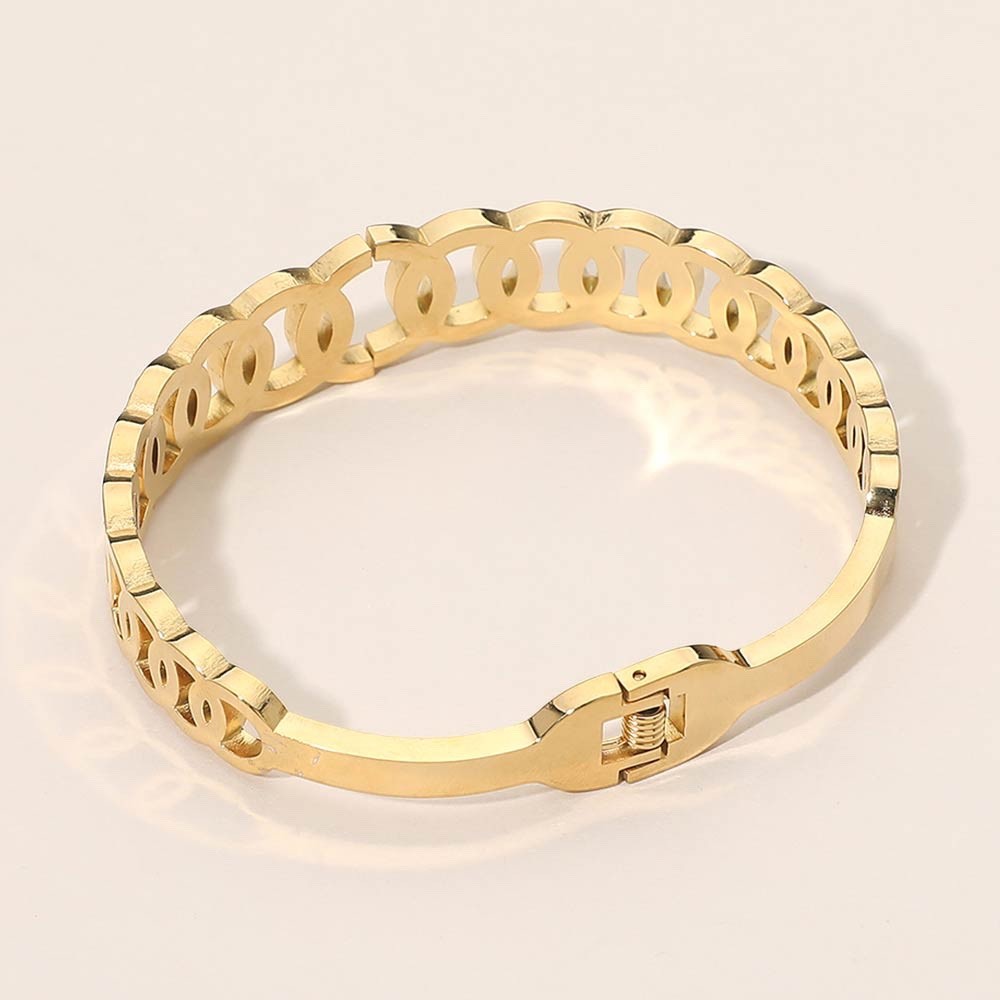Gold Interlocking Oval Bangle Bracelet with Pave Crystal Accents Stainless Steel