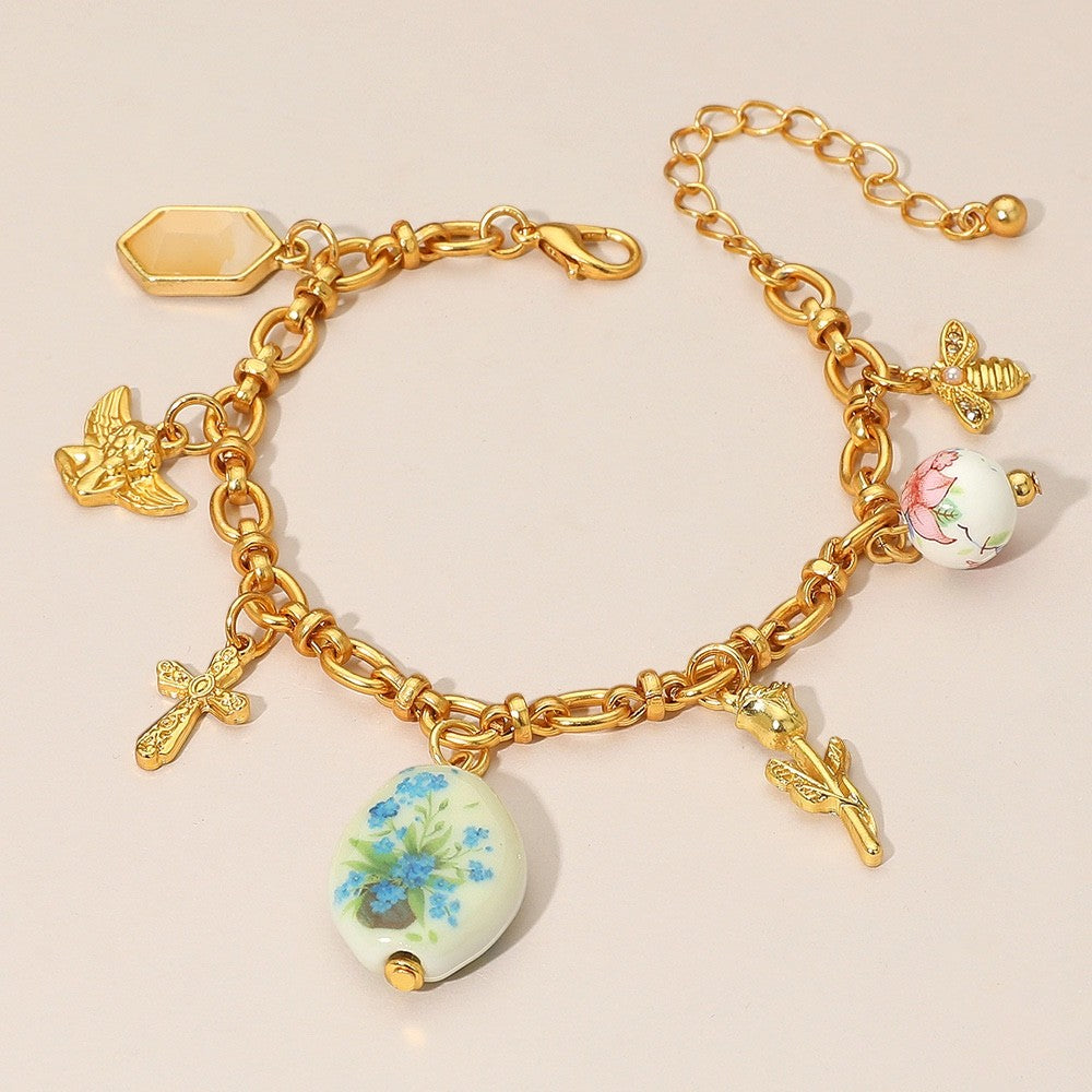 Dainty Gold Floral Charm Link Bracelet Vintage Porcelain Bee Cross Jewelry Gift