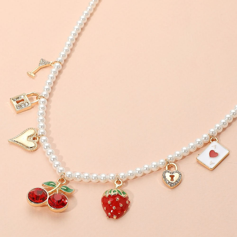 Gold Tone Faux Pearl Charm Necklace with Cherry and Strawberry Fruit Accents