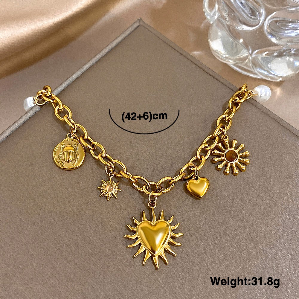 Gold Tone Celestial Charms Statement Necklace for Women Moon and Star Jewelry