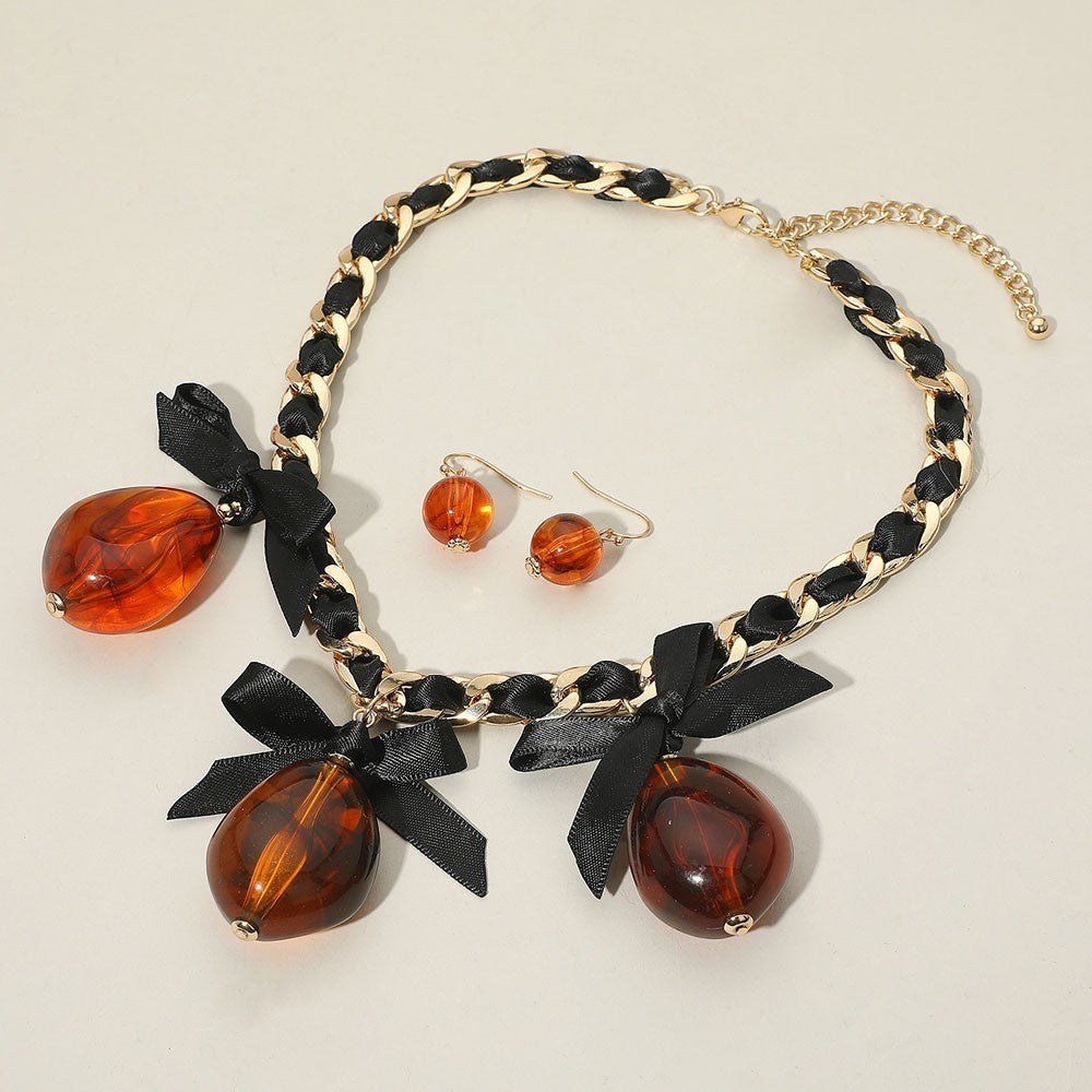 Bold Bow Resin Charm Braided Strap Statement Necklace for Women Fashion Jewelry