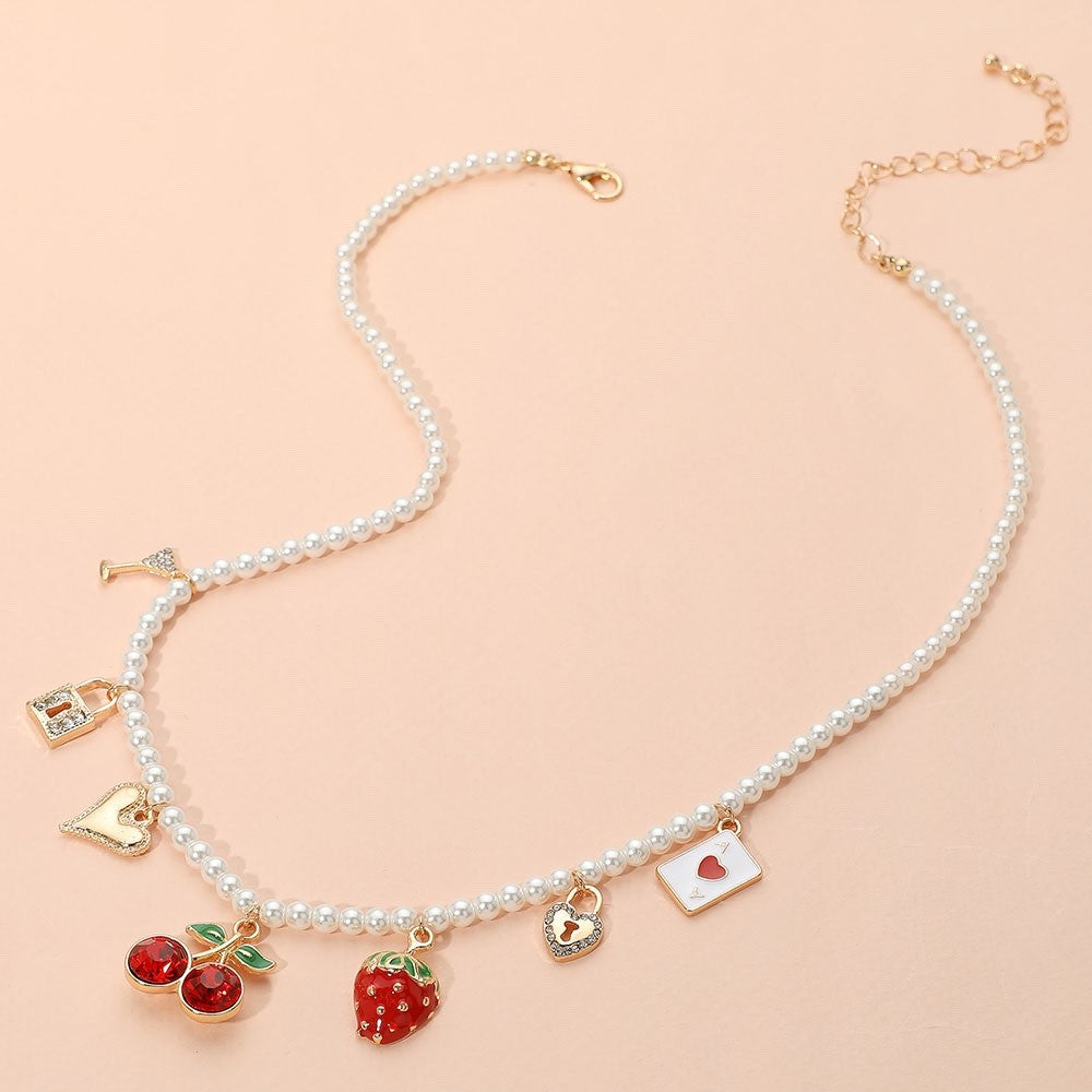 Gold Tone Faux Pearl Charm Necklace with Cherry and Strawberry Fruit Accents