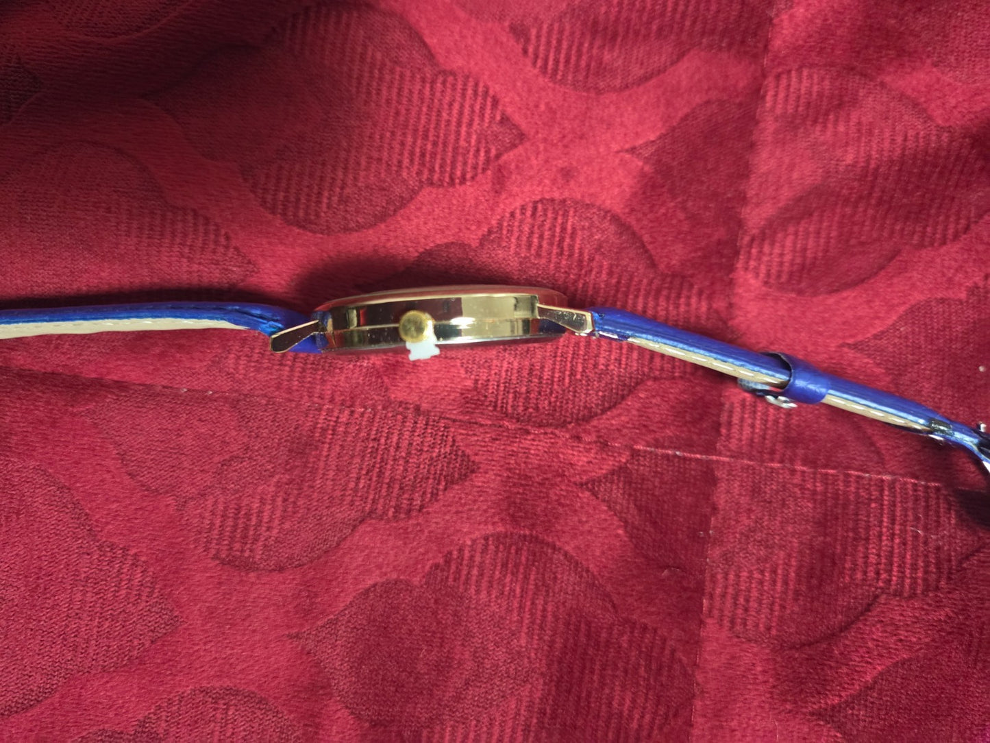 Women's Fashion Watch with Blue Strap & Butterfly Dial Roman Numerals